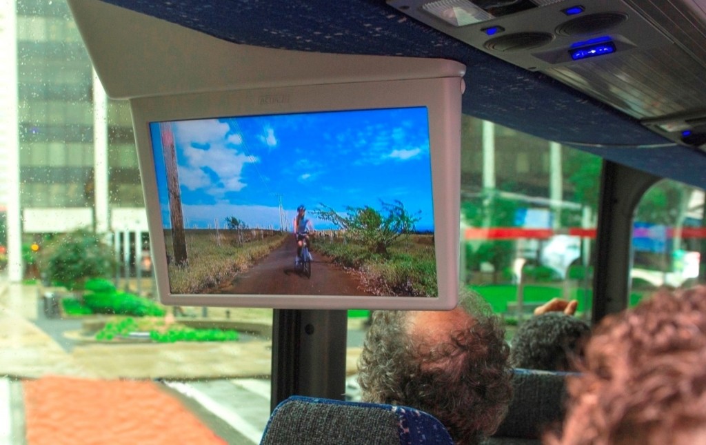 Experts watch videos on a bus via ATSC 3.0 signals.