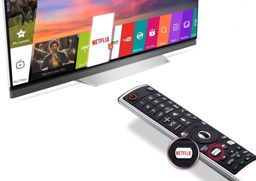 2017 LG OLED TV with Netflix app selected, shown next to Magic Remote with magnified image of Netflix shortcut button