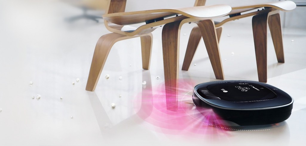 LG HOM-BOT Turbo+ navigating its way under two chairs