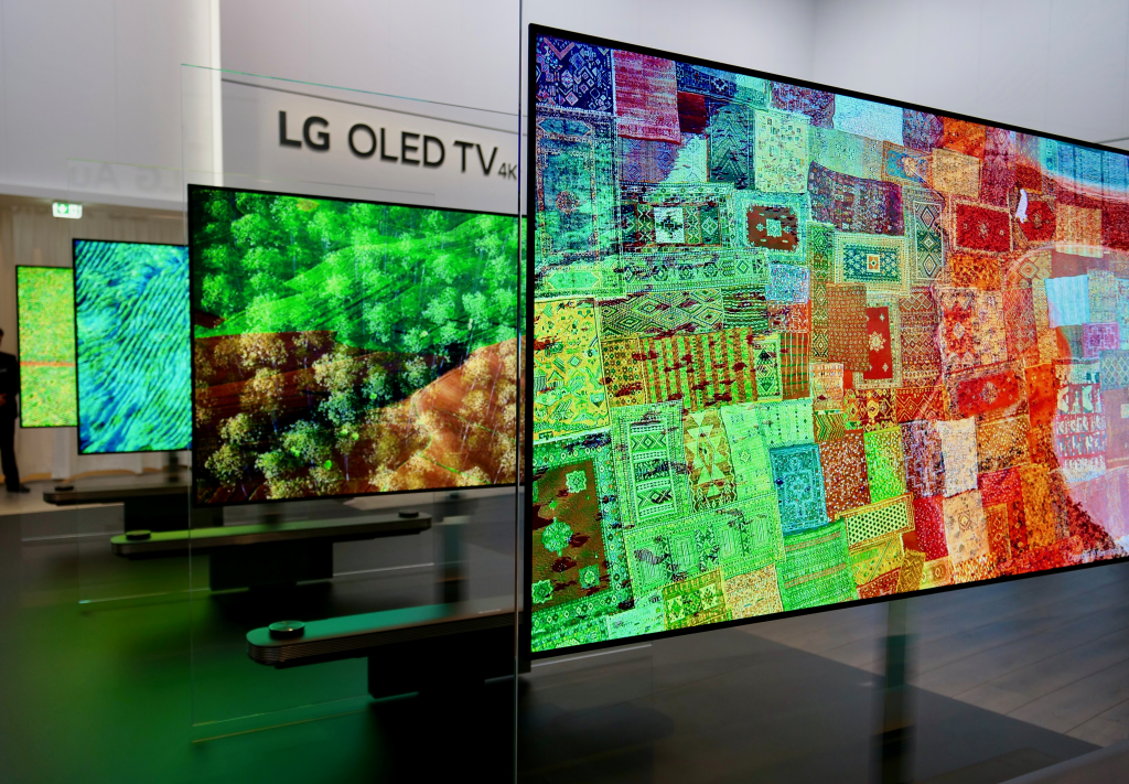 Several LG SIGNATURE OLED TV W television sets on display at LG’s booth during IFA 2017