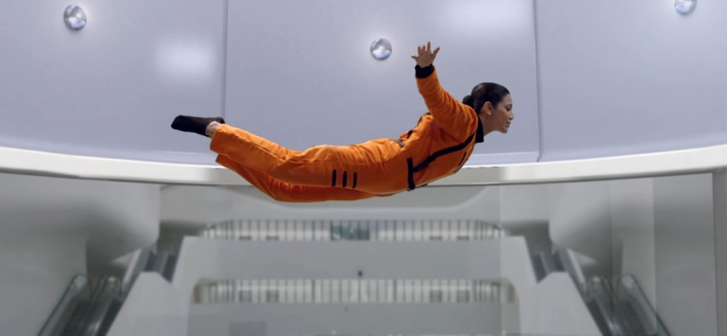 A screenshot of LG India’s “Astronaut” video, there are a woman who in in an astronaut training inside a special facility.