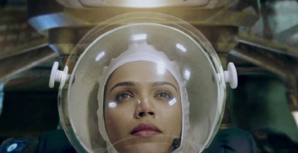 A screenshot of LG India’s “Astronaut” video, a woman wearing the astronaut suit is waiting for the departure of the spaceship.