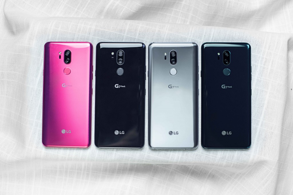 The rear view of the LG G7 ThinQ in Raspberry Rose, New Aurora Black, New Platinum Gray and New Moroccan Blue, side-by-side