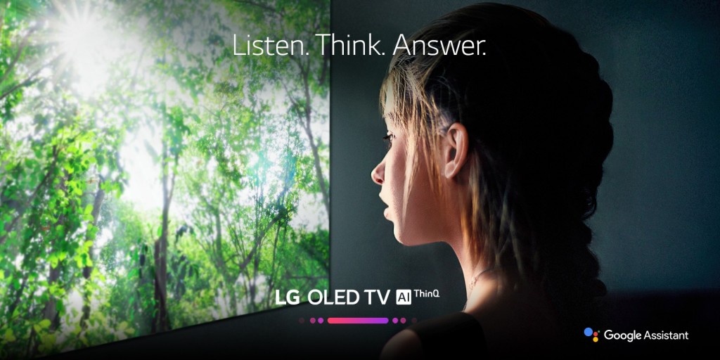 A promo shot for LG OLED TV AI ThinQ with a woman watching the TV’s display with the slogan, ‘Listen, Think, Answer.