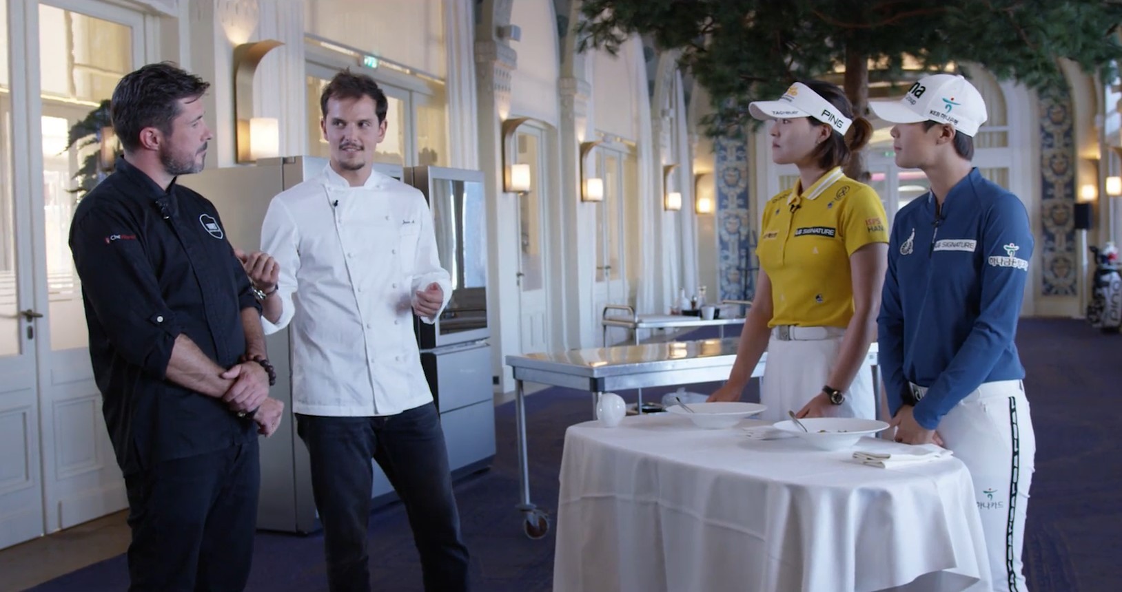 Two European star chefs – Juan Arbelaez and Christopher Crell, explain their signature cuisine to Korean golfers Park Sung-hyun and Chun In-gee who are competing at the 2018 Evian Championship.