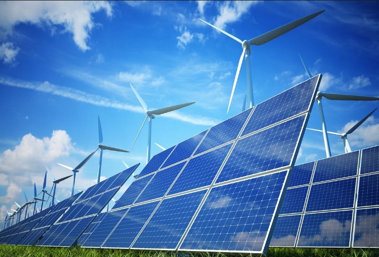 A series of solar panels and wind turbines in the outdoor renewable power plant