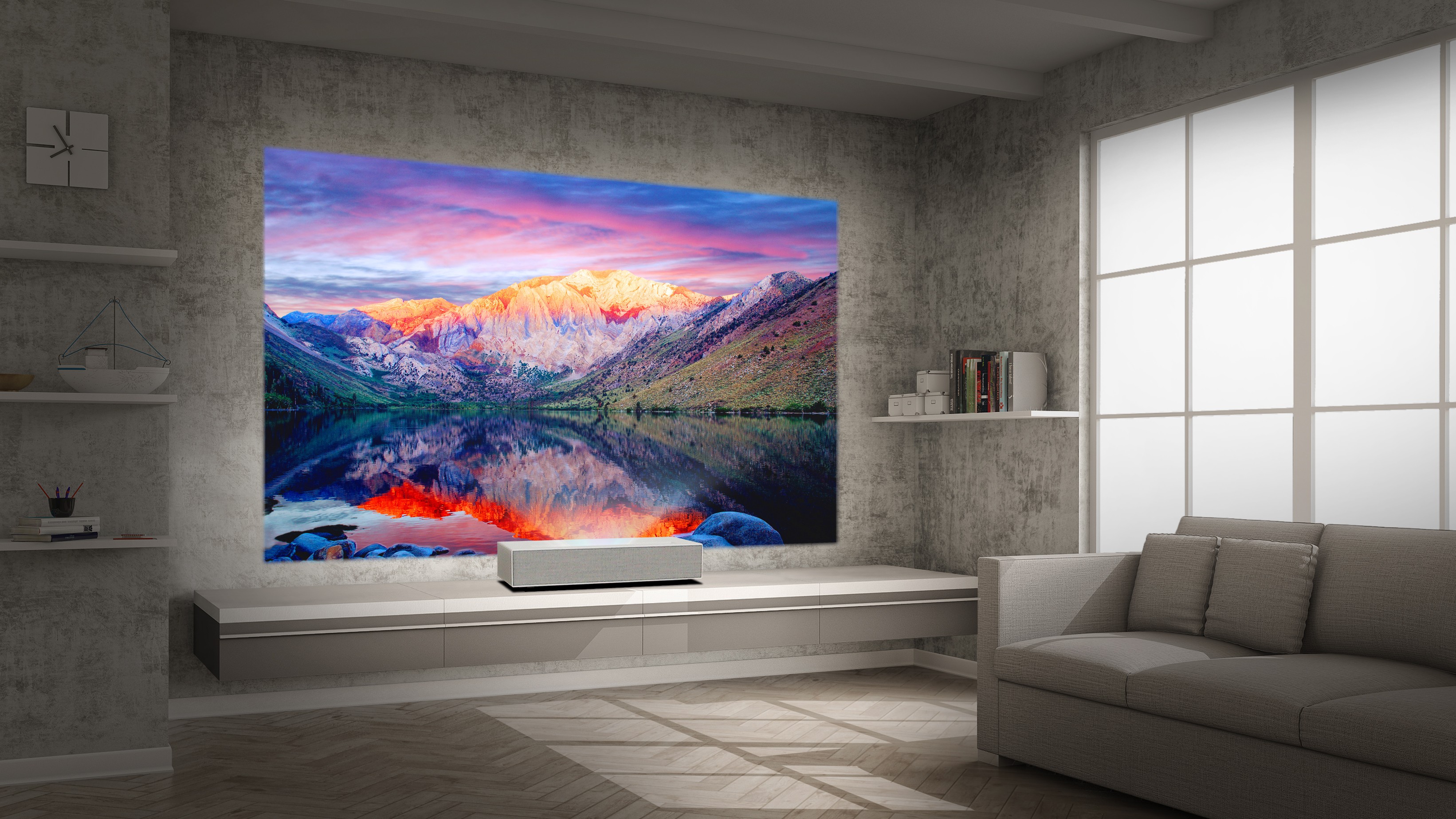 A view of LG CineBeam 4K UHD projector model HU85L producing incredible natural landscapes in a modern, low-lit living room