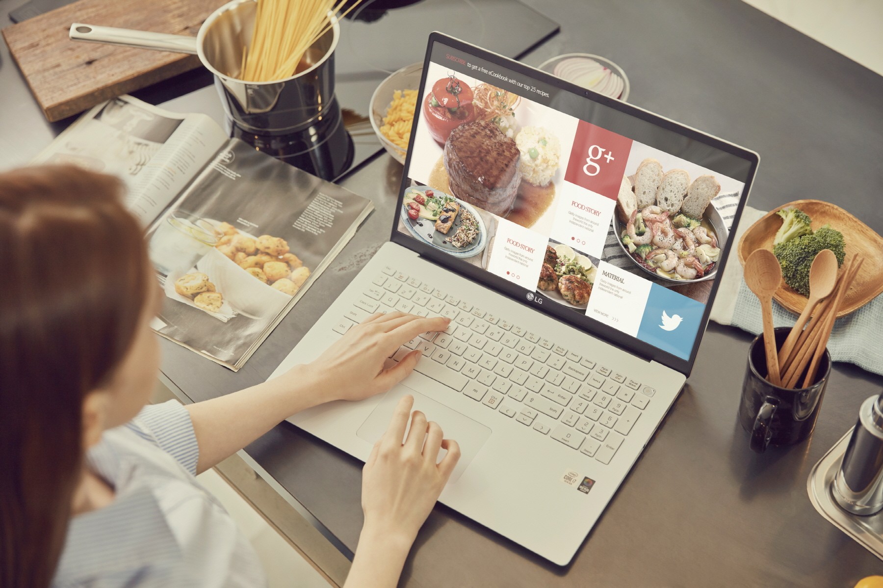 A woman searching for recipes on her LG gram model 17Z90N as she begins preparing food in her kitchen without the need for a charger.