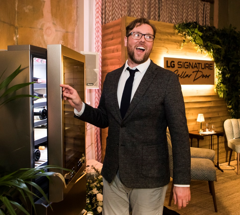 Damian Barr, London’s famous novelist, looking thrilled as he opens the LG Wine Cellar
