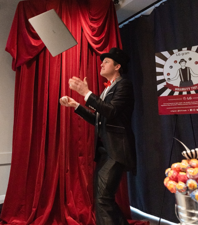 An entertainer uses LG gram in his juggling routine while on stage at an LG event