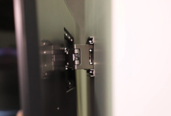 A close-up shot of the integrated bracket which holds the LG GX Gallery series TV against the wall