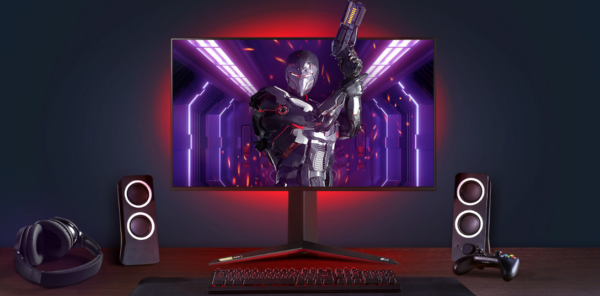 A complete gaming setup with LG UltraGear as the centerpiece, the monitor's back lights shining bright red and the game character bursting out of the display
