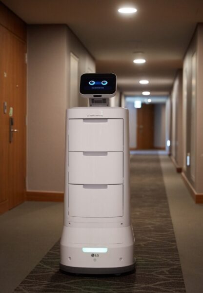 LG CLOi ServeBot carrying out room service by delivering supplies around the building