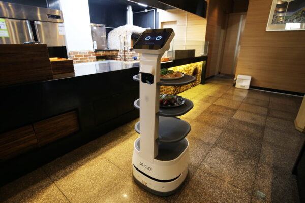 LG CLOi ServeBot being prepared to deliver meals to guests by the restaurant’s kitchen