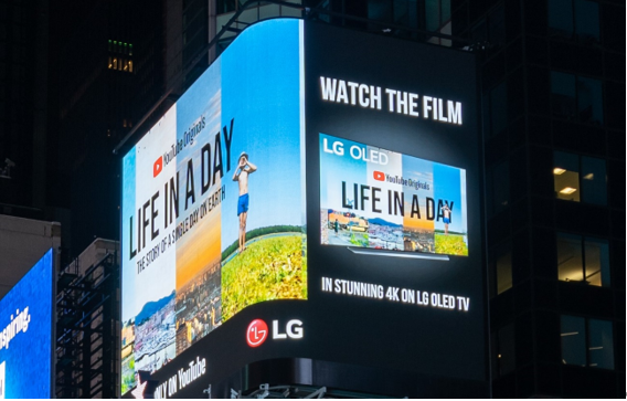 LG's enormous high-definition digital billboard in Time Square, New York, playing the YouTube Originals documentary 'Life in a Day.'
