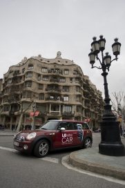 The LG Mini car driving around the beautiful, unique architecture of Barcelona