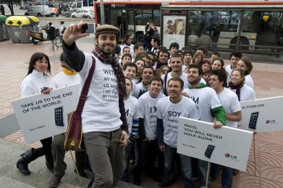 A group of people pose for a photo at the LG Mini social event in Barcelona