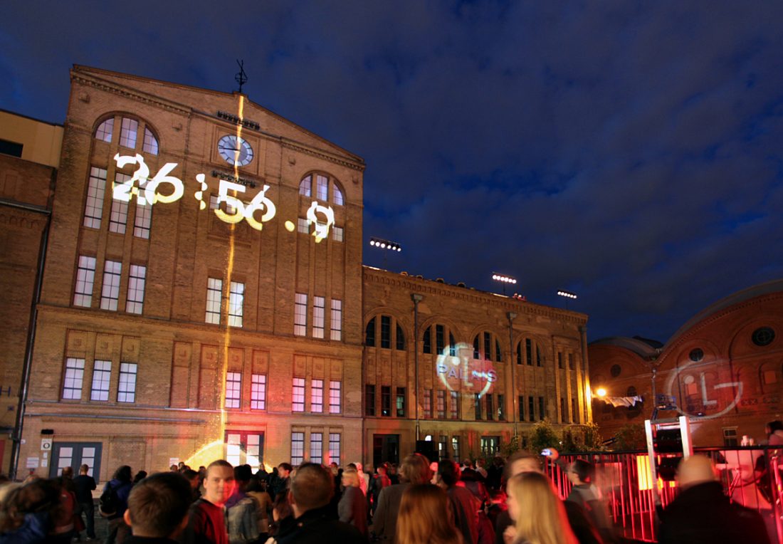 The anticipation builds among a packed crowd waiting for the LG Optimus One event in Kulturbrauerei, Berlin, to begin.