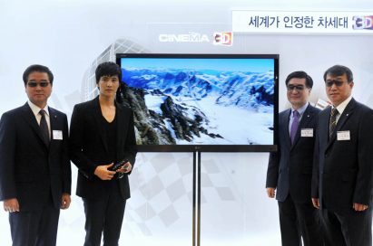 Marketing image of four people flanking LG’s NEW CINEMA 3D TV