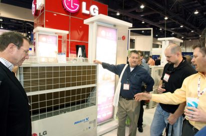 Visitors to LG's booth look inside one of LG’s Multi V air solutions.