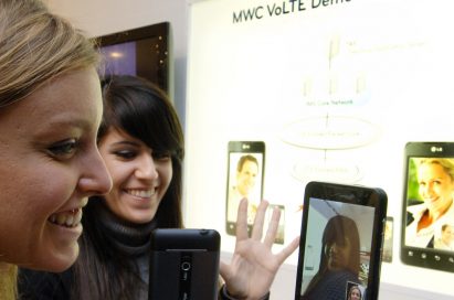 Two female models are demonstrating Video Call via LTE in LG’s booth