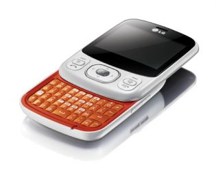 The White Orange LG Town C320 - as if laid on a table - slid upwards, exposing its slidable orange keyboard