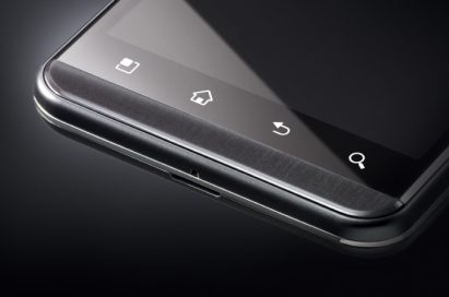 A bottom-side view of the LG Optimus 3D with black in the background