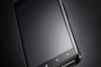 A 45 degrees counter-clockwise view of the LG Optimus 3D with black in the background