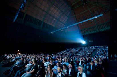 Approximately 1,500 guests watching a screening of the new 3D movie Rio on a massive 27m x 11m screen at the Le Grand Palais in Paris’