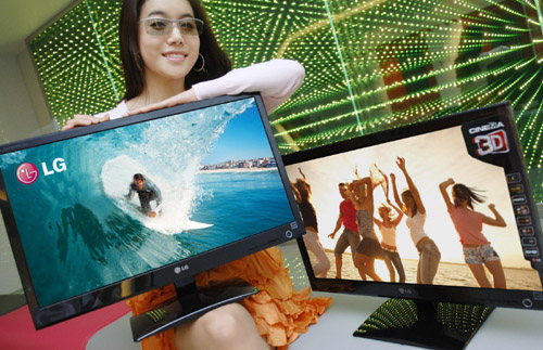 A model wearing 3D glasses presents two LG Cinema 3D Monitors.