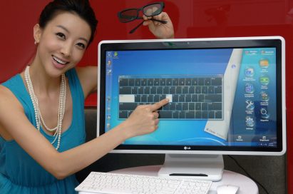 A model is posing with the LG all-in-one PC model V3001