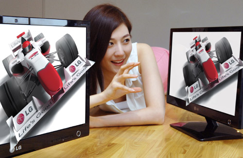 A model poses with LG’s glasses-free 3D monitors (model D2000).