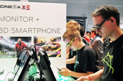 Visitors experiencing LG 3D smartphones at LG 3D Game Festival in Gamescom