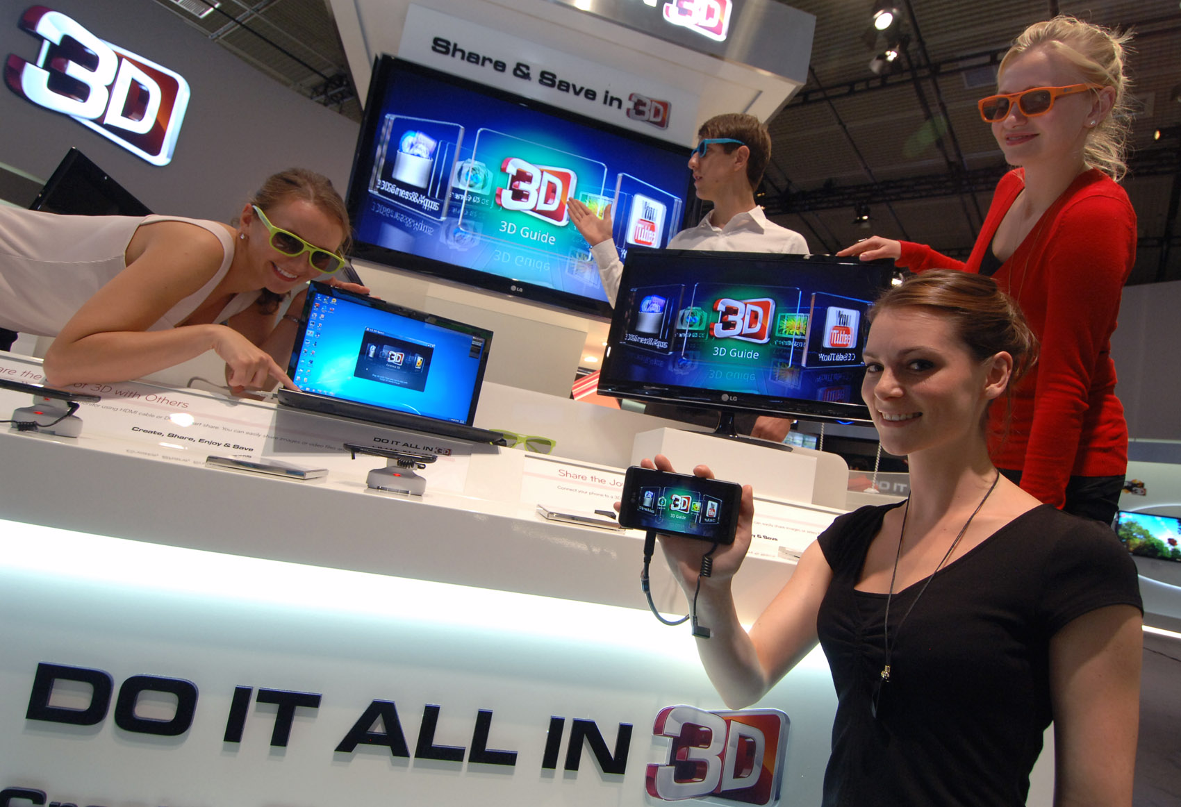 A zoom-in image of LG's diverse lineups shown at IFA 2011 including TVs, monitors, mobiles, and laptops with models