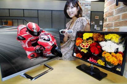 A model holds 3D glasses while presenting LG’s 2012 IPS monitors