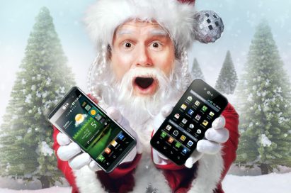 Santa Claus holds LG Optimus 3D and LG Optimus Black and shows its front views