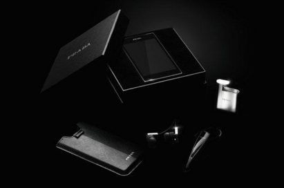 All components of the PRADA phone by LG 3.0 including PRADA branded box, back cover case, cradle and Bluetooth ear set are displayed