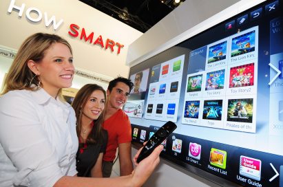 Visitors to the LG booth trying LG’s Proprietary Smart TV Platform, NetCast, at CES 2012