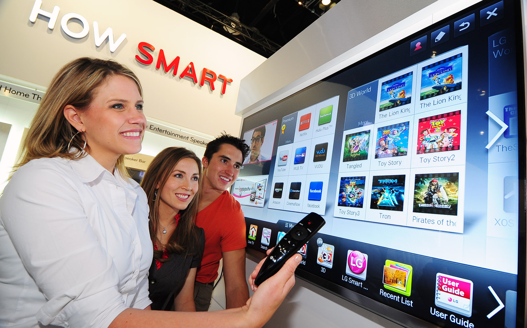 Visitors to the LG booth trying LG’s Proprietary Smart TV Platform, NetCast, at CES 2012