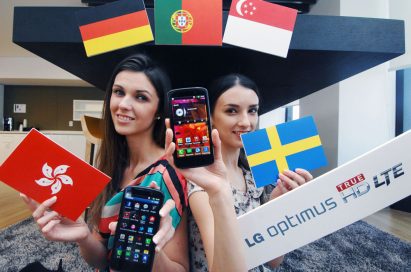 Two models holding an LG Optimus True HD LTE phone and a panel engraved with the brand name LG Optimus True HD LTE