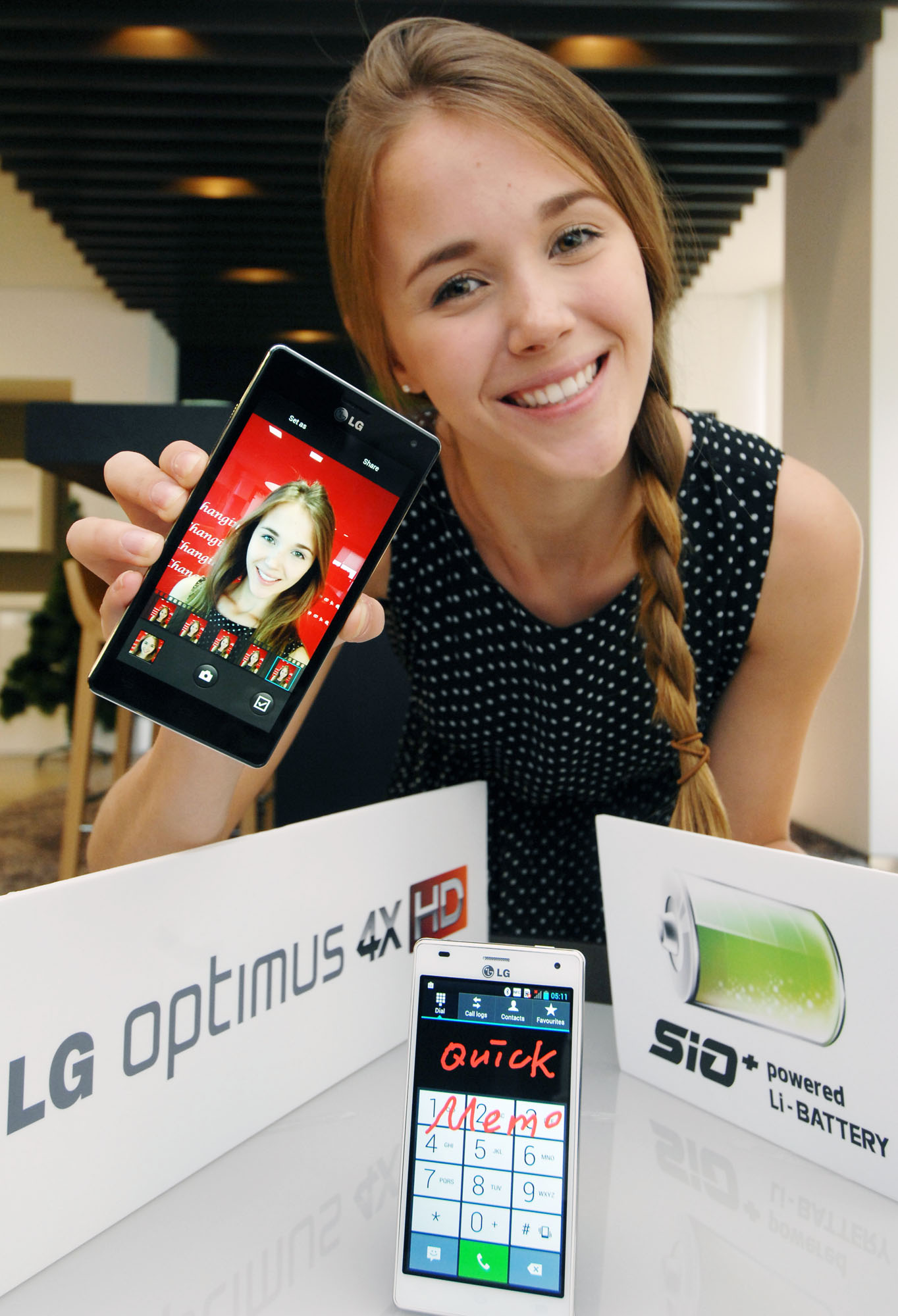 A female model holds a black LG Optimus 4X HD behind the logos of LG Optimus 4X HD and SiO technology, while a front view of the white LG Optimus 4X HD stands at the front