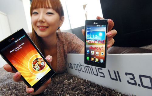 A female model holds two LG smartphones and shows a new Optimus UI 3.0