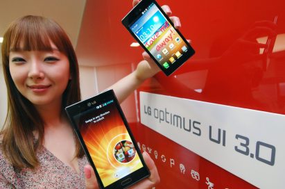 A female model holds two LG smartphones and shows a new Optimus UI 3.0