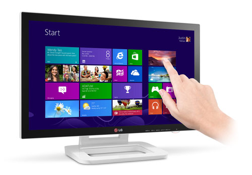 A hand touches the display of LG’ Touch 10 monitor model ET83.