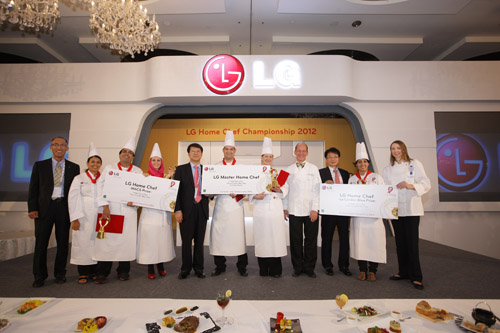 Winners of the fifth annual LG Home Chef Championship accept their awards on stage with LG representatives