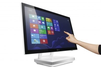 The LG All-In-One PC model V325’s display being interacted with by someone’s hand