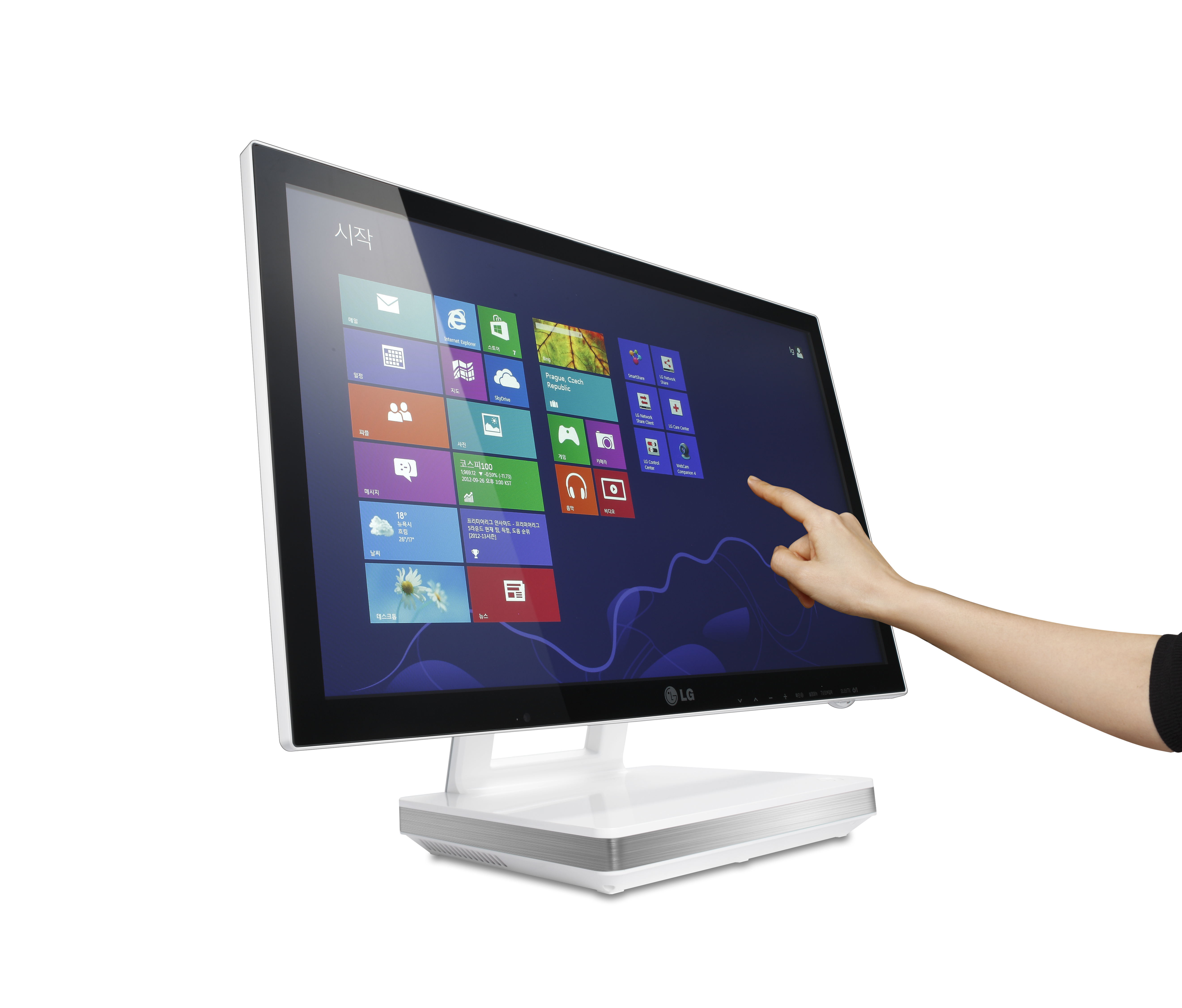 The LG All-In-One PC model V325’s display being interacted with by someone’s hand