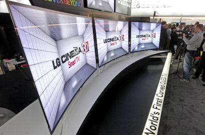 LG displaying the world’s first curved OLED TVs (model EA980) at CES 2013
