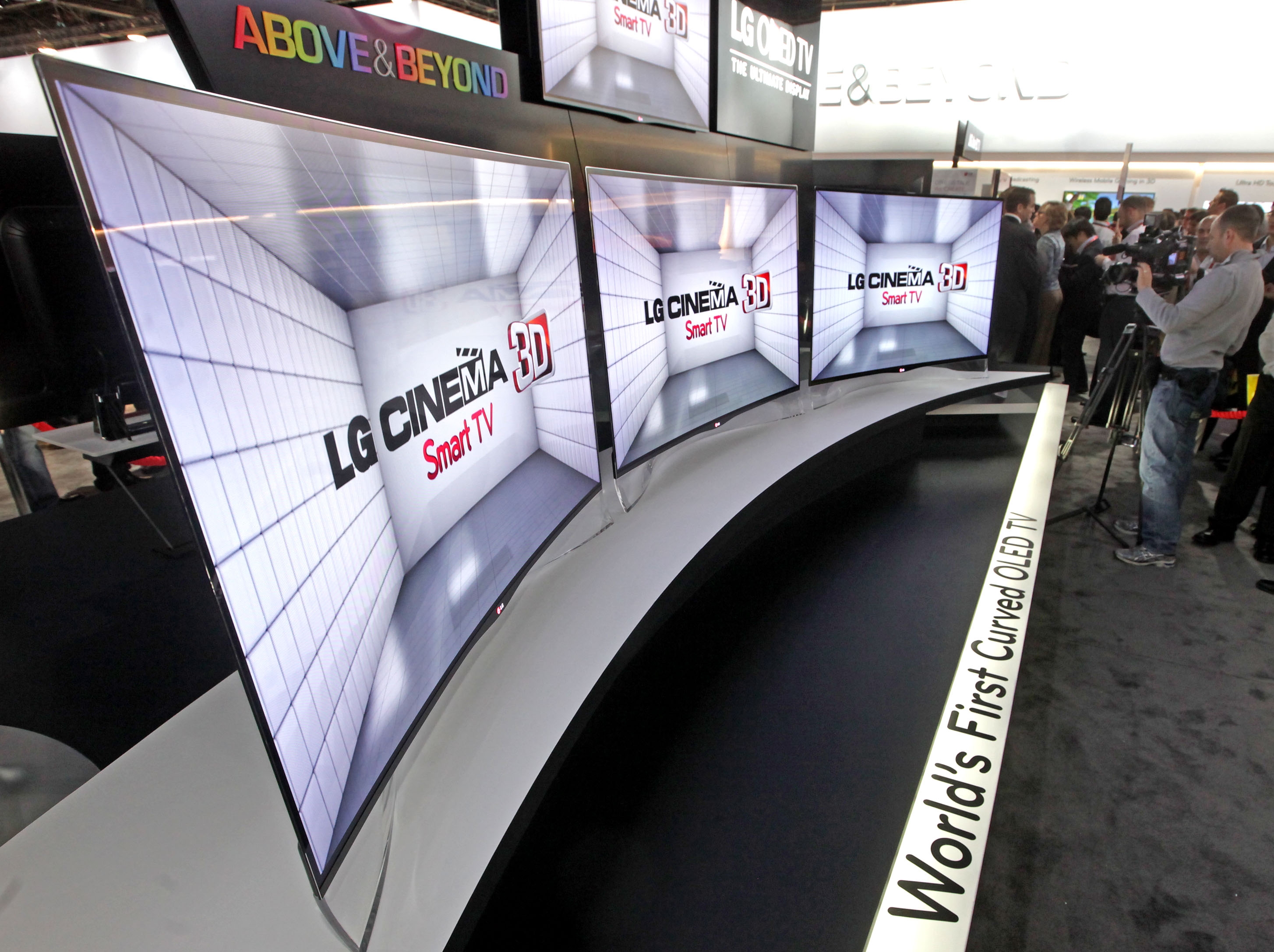 LG displaying the world’s first curved OLED TVs (model EA980) at CES 2013