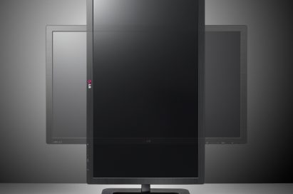 LG EA83 ColorPrime IPS Monitor rotating in front of a grey background